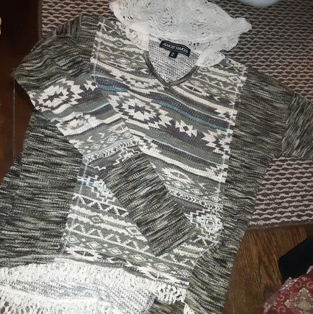ALMOST FAMOUS sweatshirt next to new